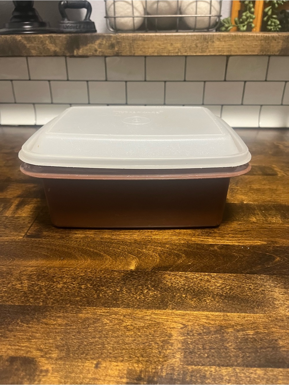 Tupperware container with white lid